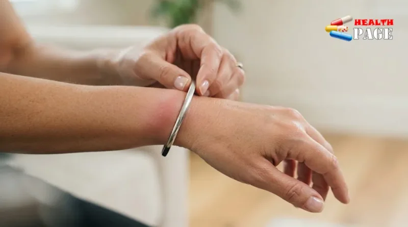 Adult gently removing a tight bracelet from a slightly swollen wrist